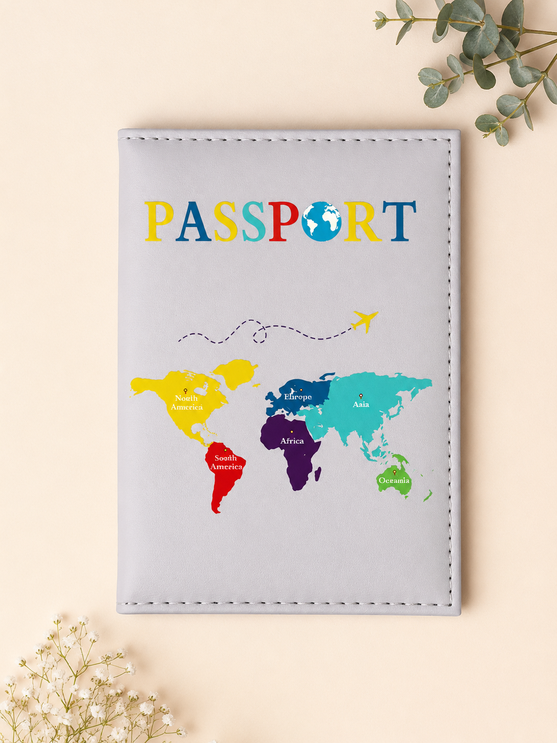 Passport holder with world map design on a beige background